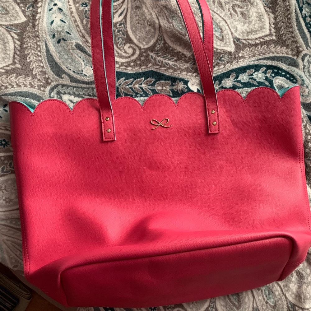 Pink zipper closed purse